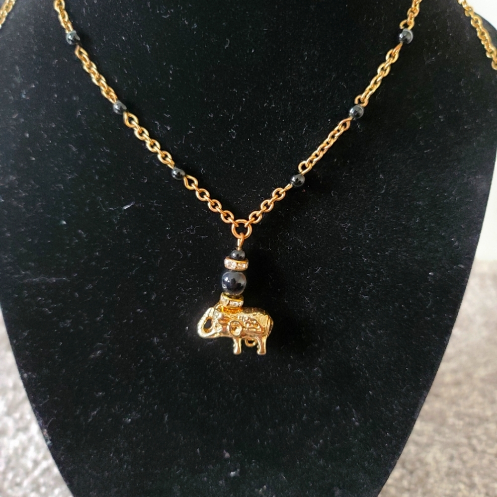 Gold elephant necklace